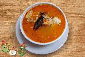 Caldo de mariscos with shrimp, fish, mussels, and clams